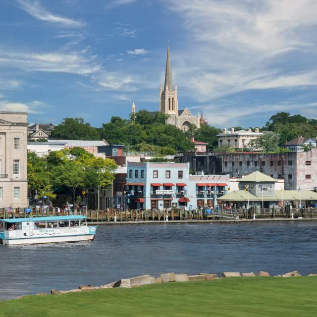 Downtown Wilmington riverfront and Cape Fear River with historic church steeple