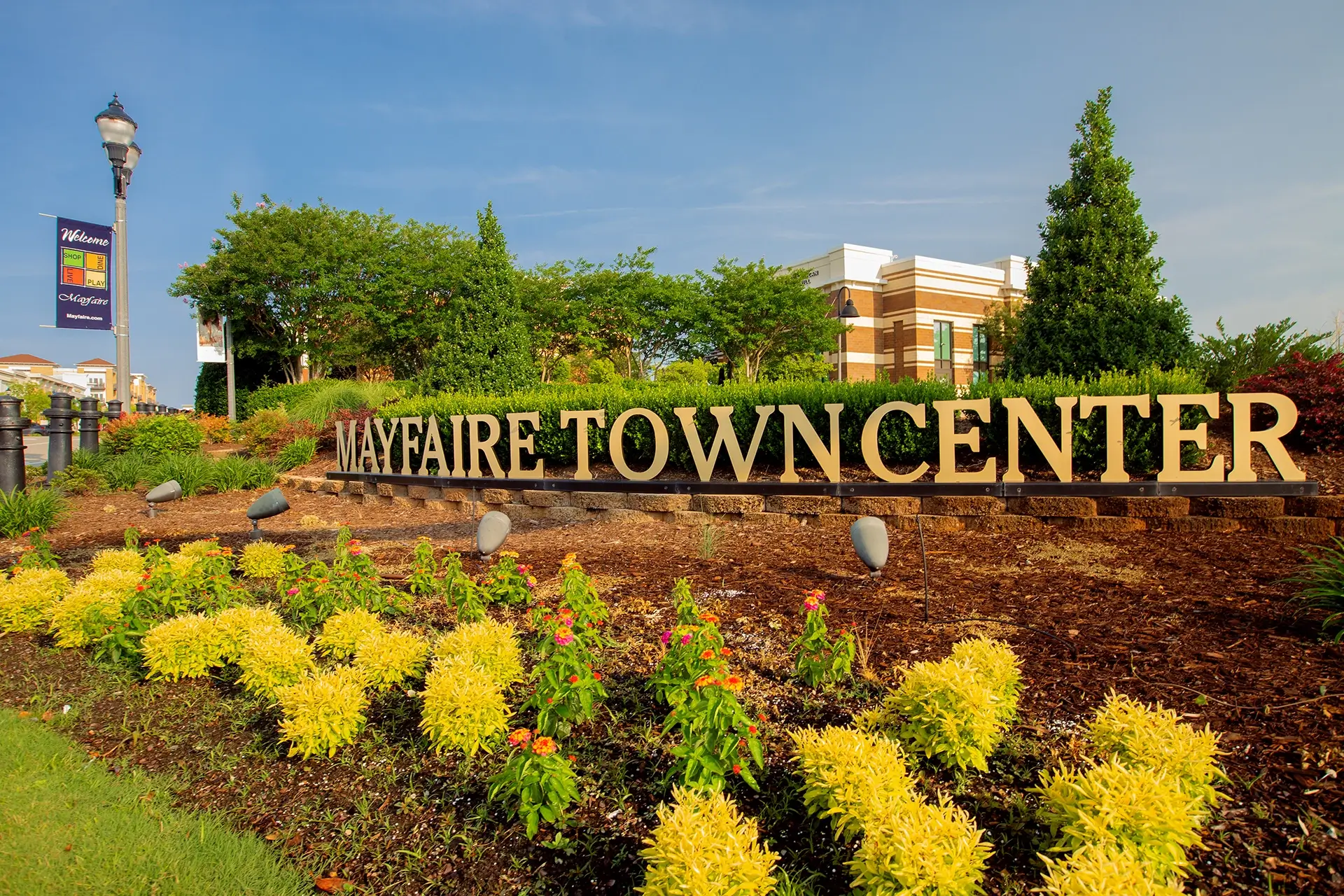Mayfaire Town Center entrance sign and landscaping in Wilmington NC