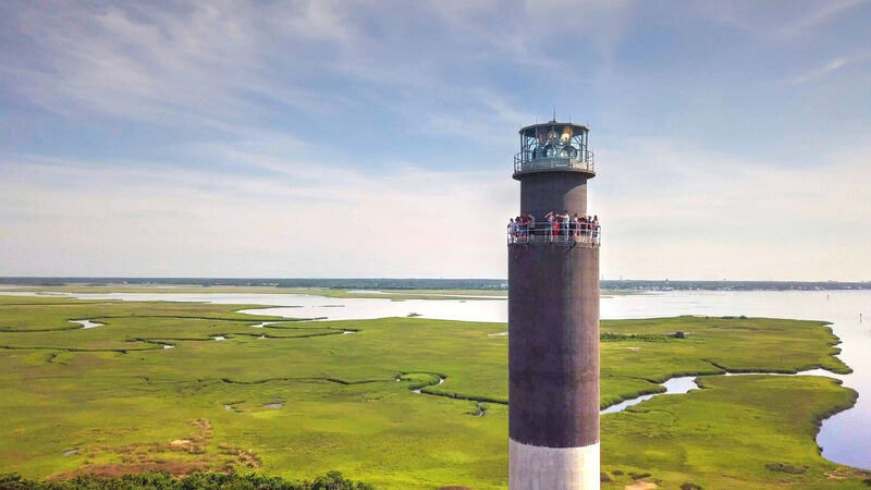 Beach shoreline and lighthouse views at Oak Island North Carolina