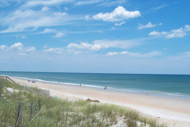 Sandy shoreline and ocean waves at Topsail Island North Carolina