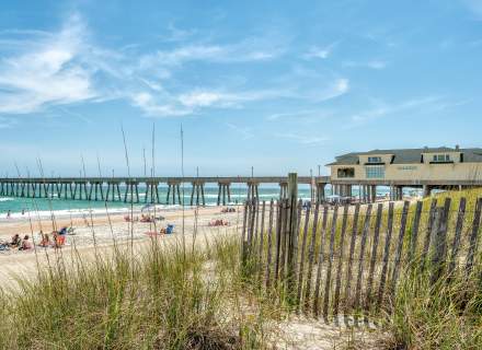 Oceanfront homes and sandy beach at Wrightsville Beach NC