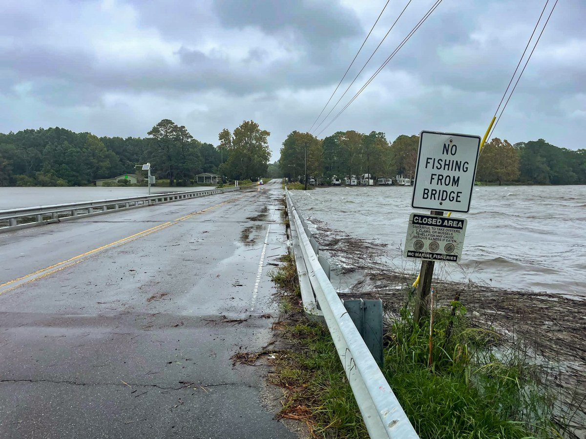 The two-lane Calabash River bridge at Calabash, North Carolina, with wind-driven water running high against the guardrail during Tropical Storm Ian in September 2022