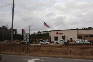 Chick-fil-A and the US 17 Business and US 17 route signs on the commercial corridor in Shallotte, North Carolina