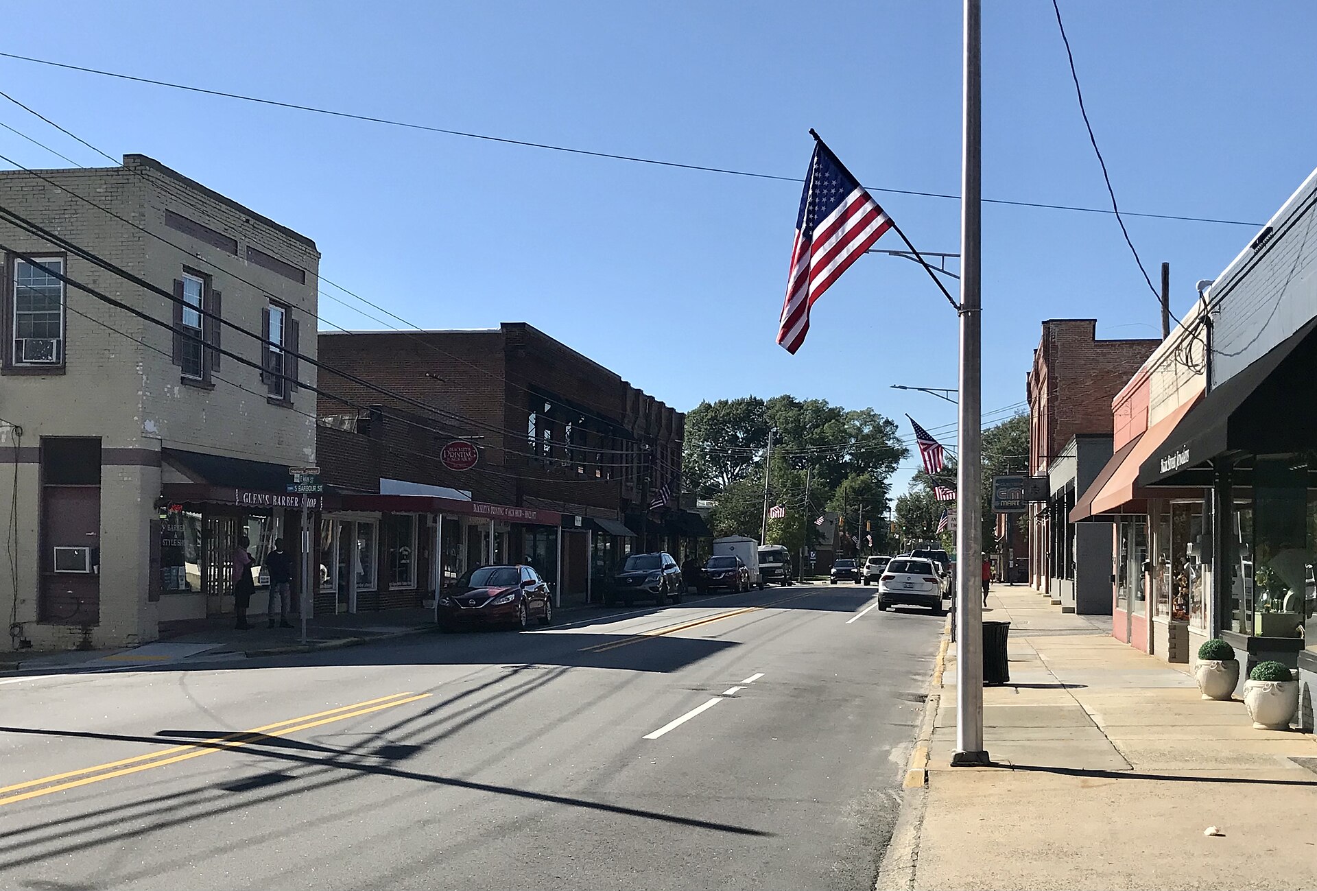 Brick storefronts and The Clayton Center on Main Street in downtown Clayton