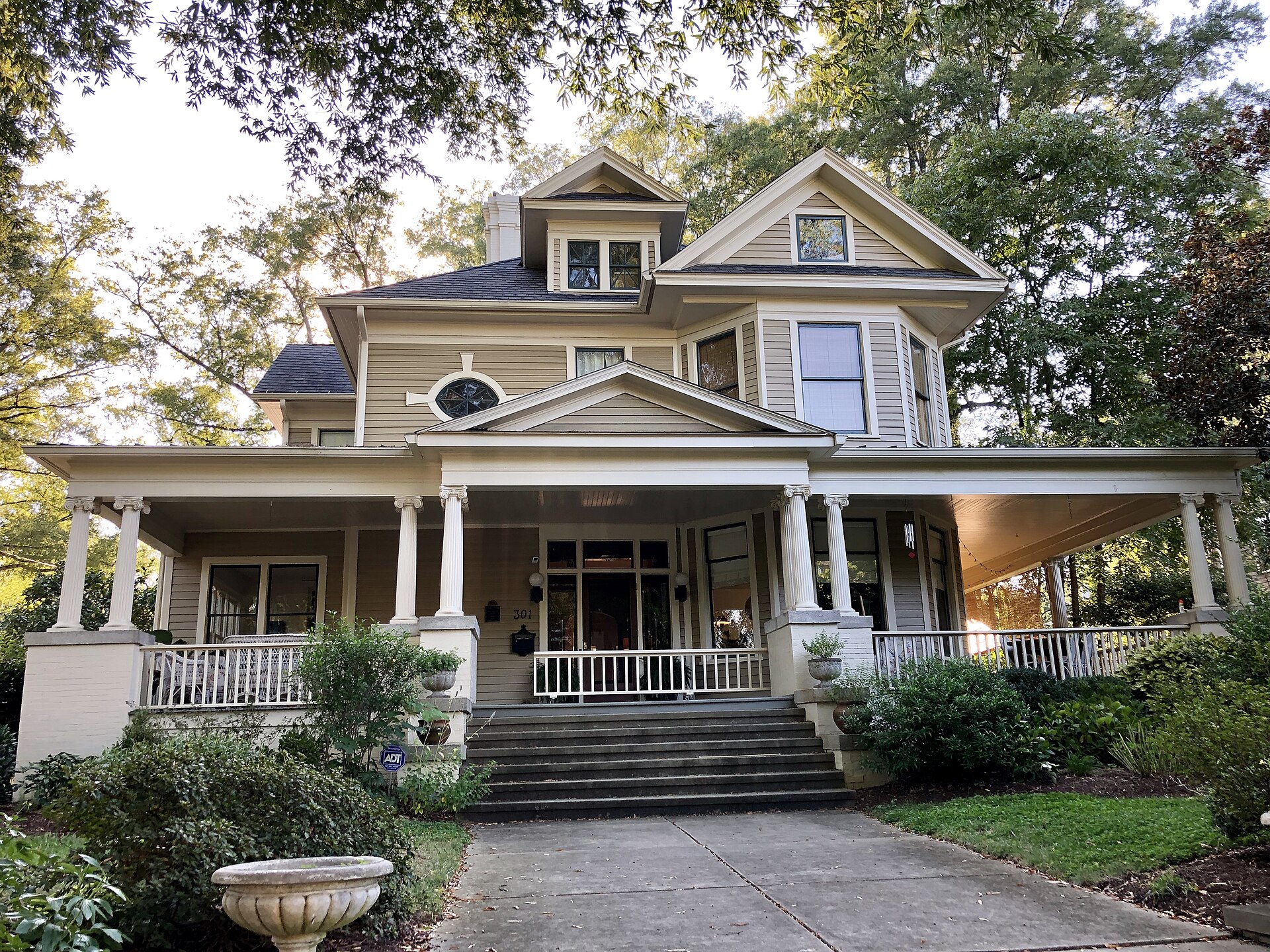 Early 1900s homes on a tree-lined street in Trinity Park