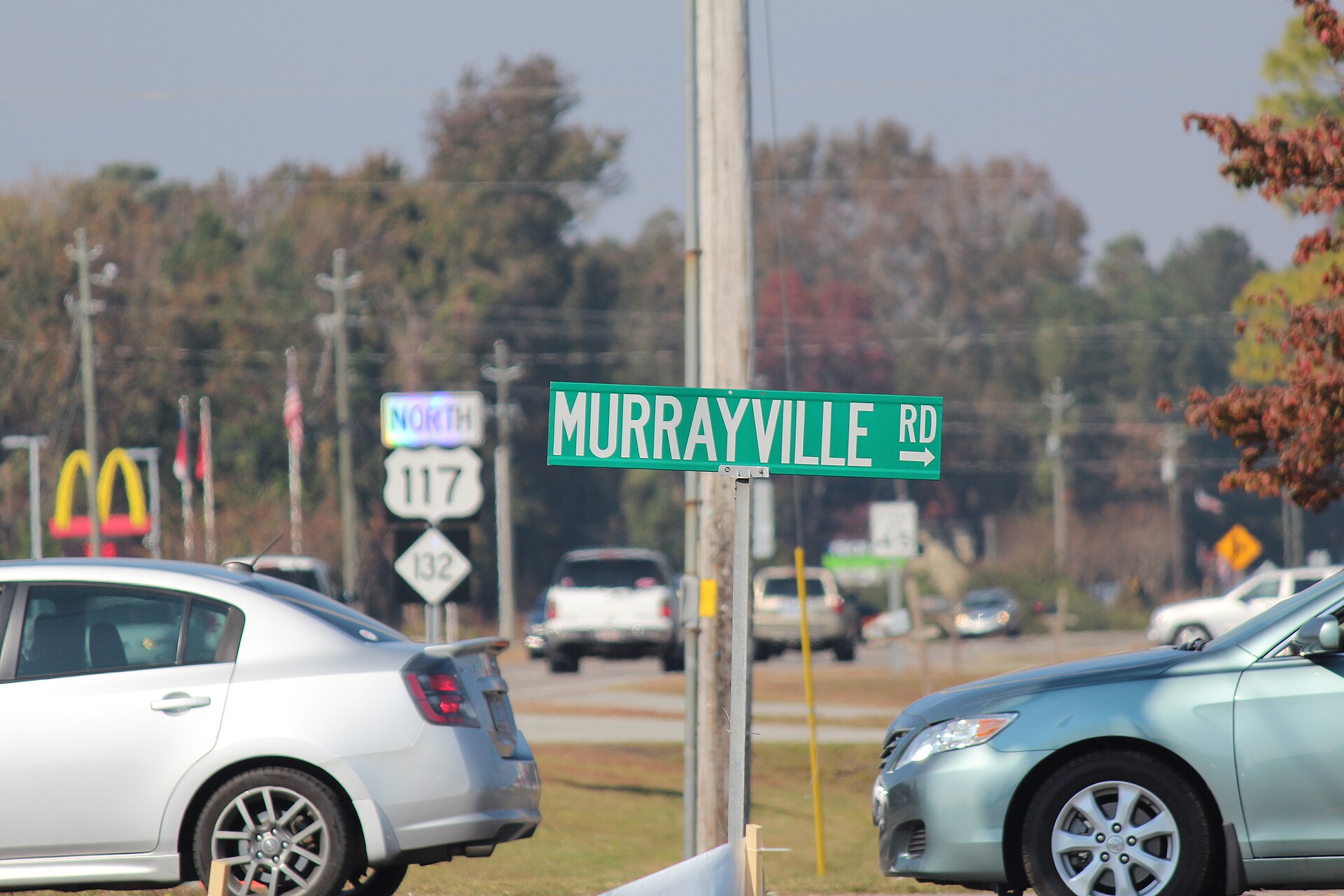 Green Murrayville Road street sign at the US 117 and NC 132 junction in Murrayville, New Hanover County, North Carolina