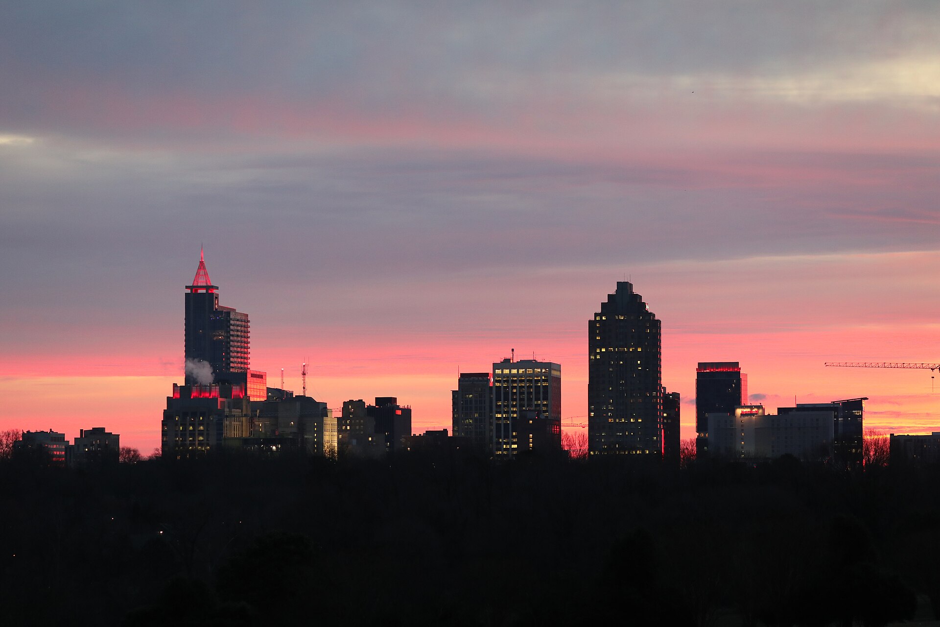 Downtown Raleigh skyline at sunrise from Dorothea Dix Park