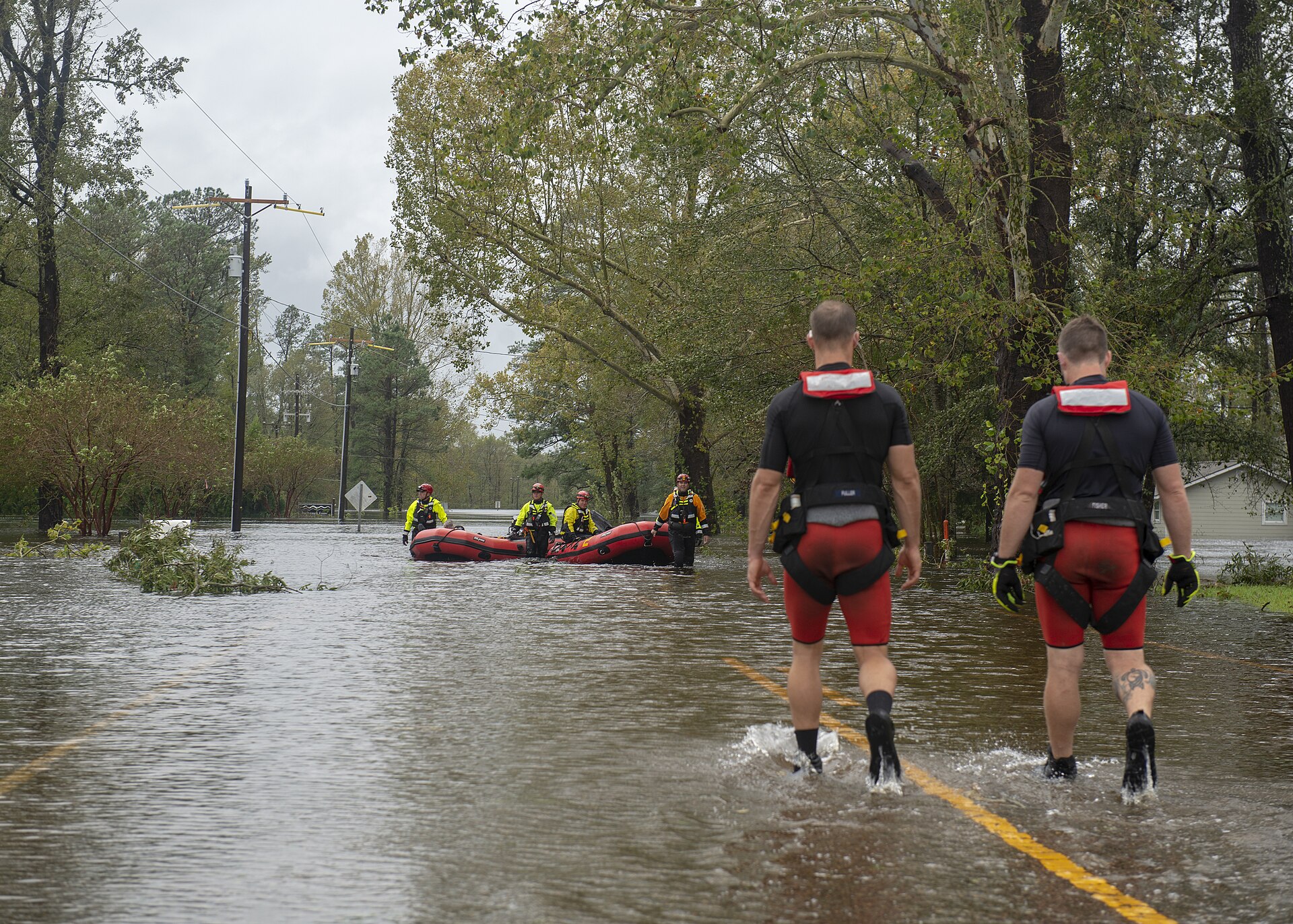 Coast Guard helicopter crew evacuating residents from a flooded neighborhood in Rocky Point, Pender County, North Carolina, after Hurricane Florence